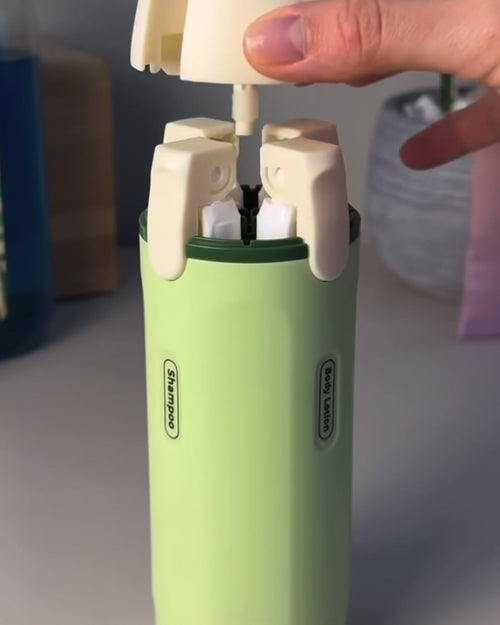 Groene reisdispenser 4-in-1 met vier flesjes